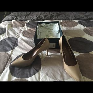 Beige platform pumps